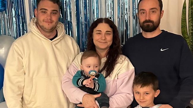 Sarah Johnson with sons Zane Johnson, Alec Nicol, 7, Elijah Nicol, 17 months and partner Jason Nicol, 43. Sarah Johnson was given a year to live after doctors found a huge tumour in her liver. Picture: Supplied by family