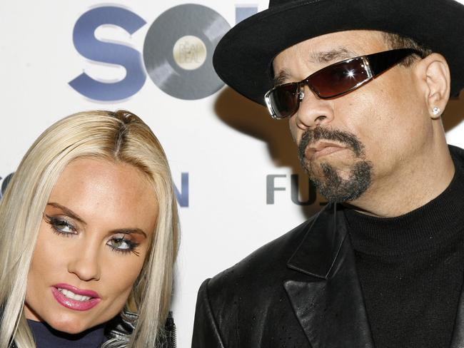 Ice T and his wife Coco arrive to the world premiere of the film 'Soul Men' at the Apollo Theater in New York, Tuesday, Oct. 28, 2008. (AP Photo/Stuart Ramson)