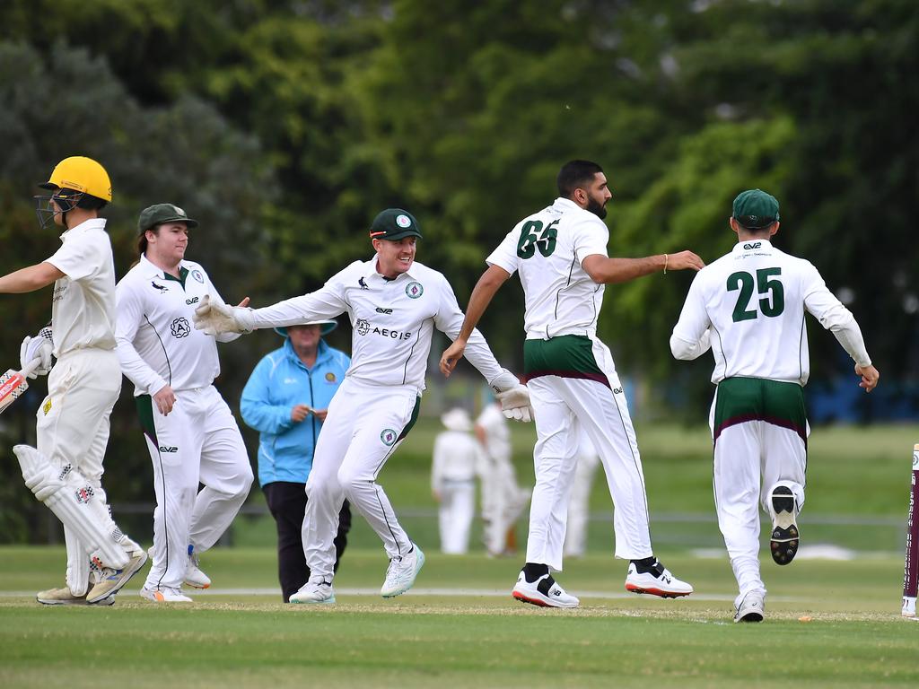 Souths celebrate a wicket South Brisbane v Wests in the Sci-Fleet first grade competition. Saturday October 1, 2022. Picture, John Gass