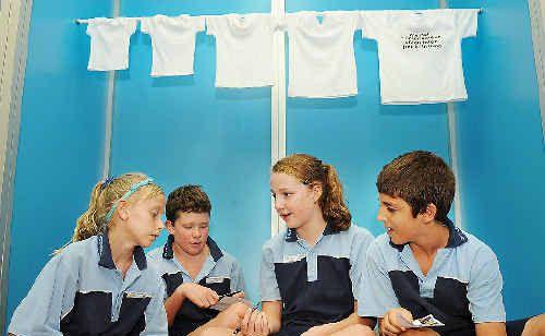 Cara Feain-Ryan (left),11, Harrison Leslie,11, Hannah Isaac,12 and Angus Cannon,11, of St Joseph’s School at Alstonville take part at the Caritas Millennium Development Goals and You Exhibition at Lismore Workers Club. . Picture: Jacklyn Wagner