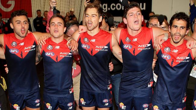 Melbourne players sing the song. Picture: Wayne Ludbey