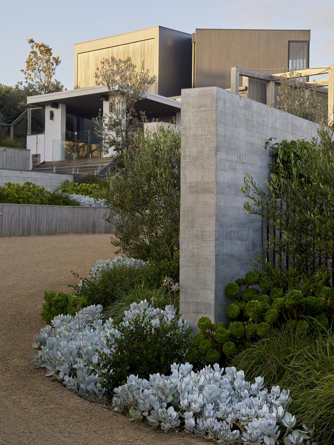 The concrete walls anchor the house to the site