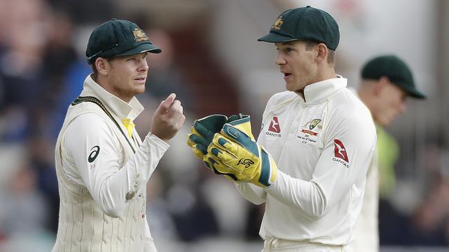 Steve Smith (left) chats with captain Tim Paine during the fourth Ashes Test. Picture: Getty Images