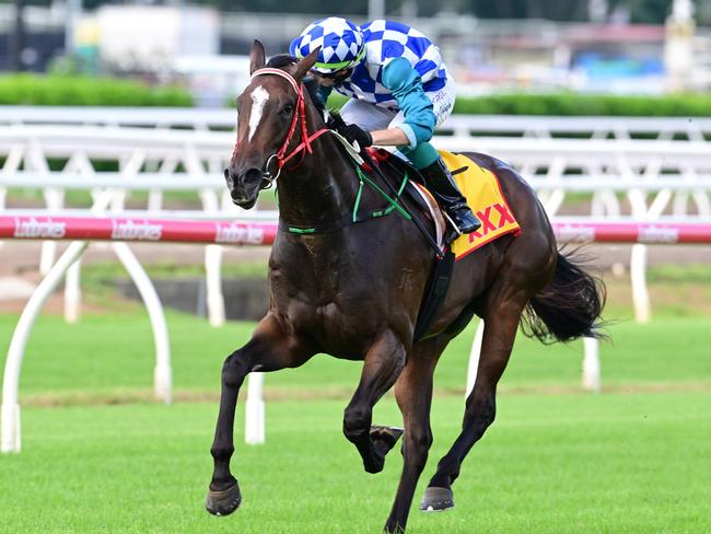 Exotique Miss dashes clear at Eagle Farm under jockey Robbie Dolan to become a winter carnival contender. Picture: Grant Peters - Trackside Photography.