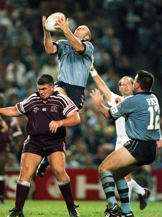 Tim Brasher goes high for ball during game two of NSW v Queensland 1996 State of Origin series.