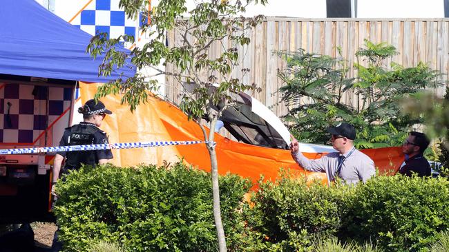 Police at the scene where Shane Bowden was shot. Picture: Richard Gosling