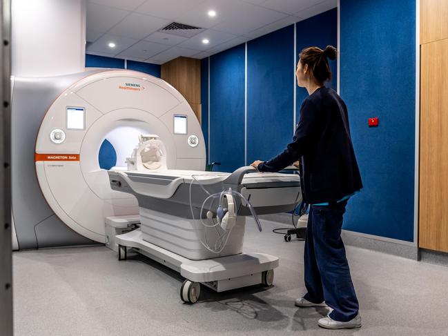 AAP / Hornsby AdvocateAmy Li diagnostic radiographer poses for a photo near the new 1.5 T MRI in the redeveloped part of Hornsby Hospital on Tuesday, 4 February 2020. The new imaging centre will provide patients with MRI's. It means stroke patients won't have to be transferred to another hospital.( AAP IMAGE / MONIQUE HARMER)