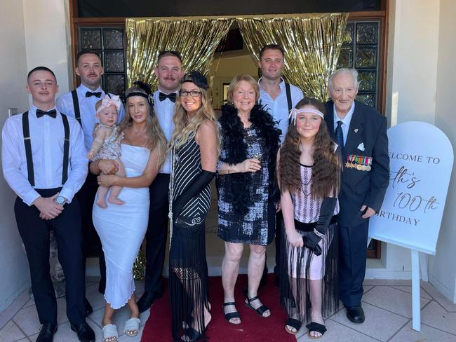World War II veteran Keith Arneman with family members at his 100th birthday party in Oxenford on the Gold Coast.