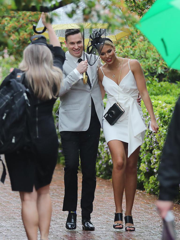 Umbrellas are the order of the day at Flemington. Picture: Alex Coppel.