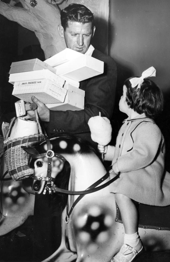 Diane Chancelor, of Carlton, on a ride while her father does the Christmas shopping in 1955