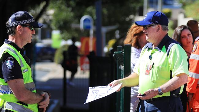 August 9, 10.35am, Griffith Street Coolangatta, Pedestrian foot traffic is stopped and checked for border passes as Queensland steps up its tightened security with Covid restrictions.Scott Powick Newscorp