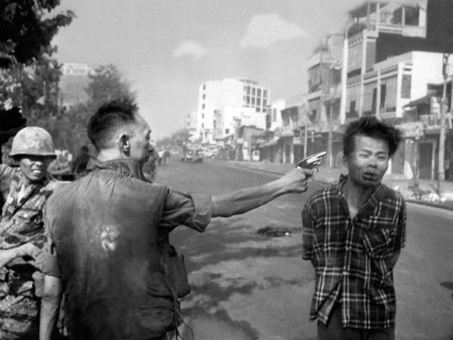 South Vietnamese Gen. Nguyen Ngoc Loan, chief of the national police, fires his pistolinto the head of suspected Viet Cong officer Nguyen Van Lem (also known as Bay Lop) on a Saigon street in 1968, early in the Tet Offensive.