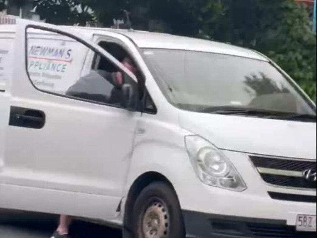 A woman managed to make a video showing a man armed with what looks like a gun entering the van.