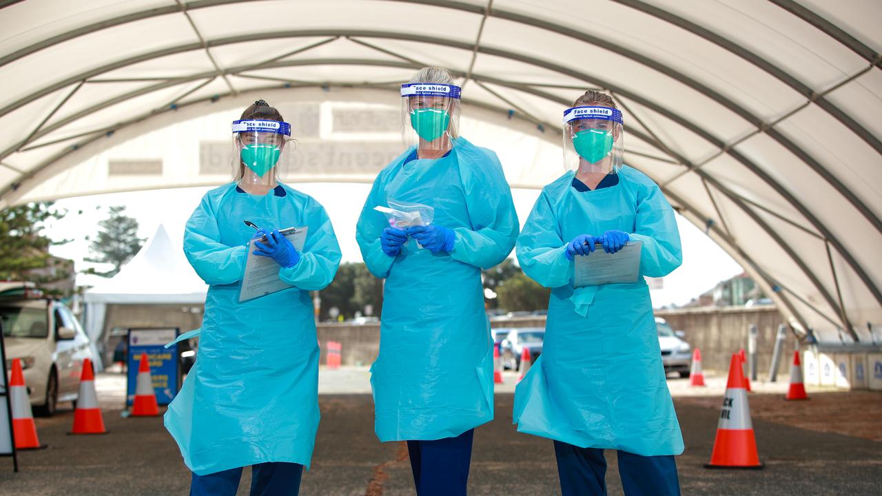 Registered nurses Ellie Taylor, Julie McGrath and Megan Keane at a COVID-19 Clinic at Bondi Beach. Picture: Justin Lloyd