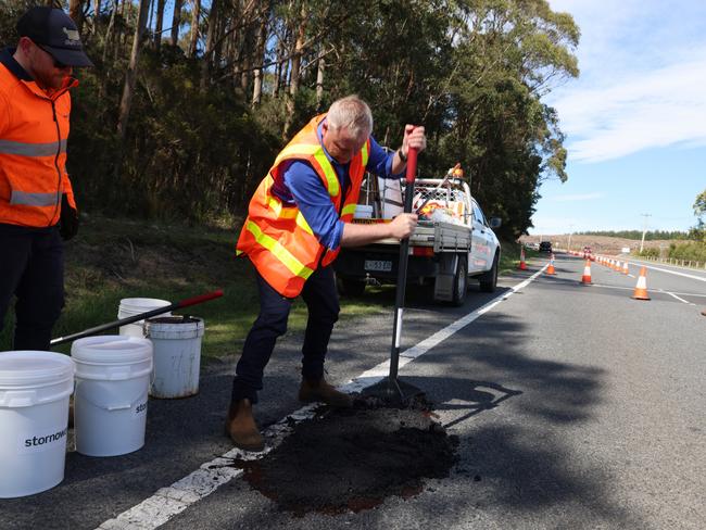 Premier Jeremy Rockliff gets to work as the government kicked off a pothole blitz on Sunday, targeting the Bass Highway following recent weather events. Picture: Supplied