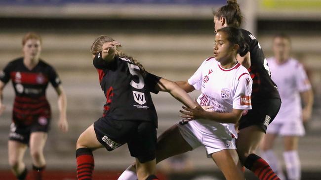 Adelaide United’s Mary Fowler is surrounded by Western Sydney Wanderers players in the 2-1 loss at Marconi Stadium. Picture: AAP Image/Jeremy Ng