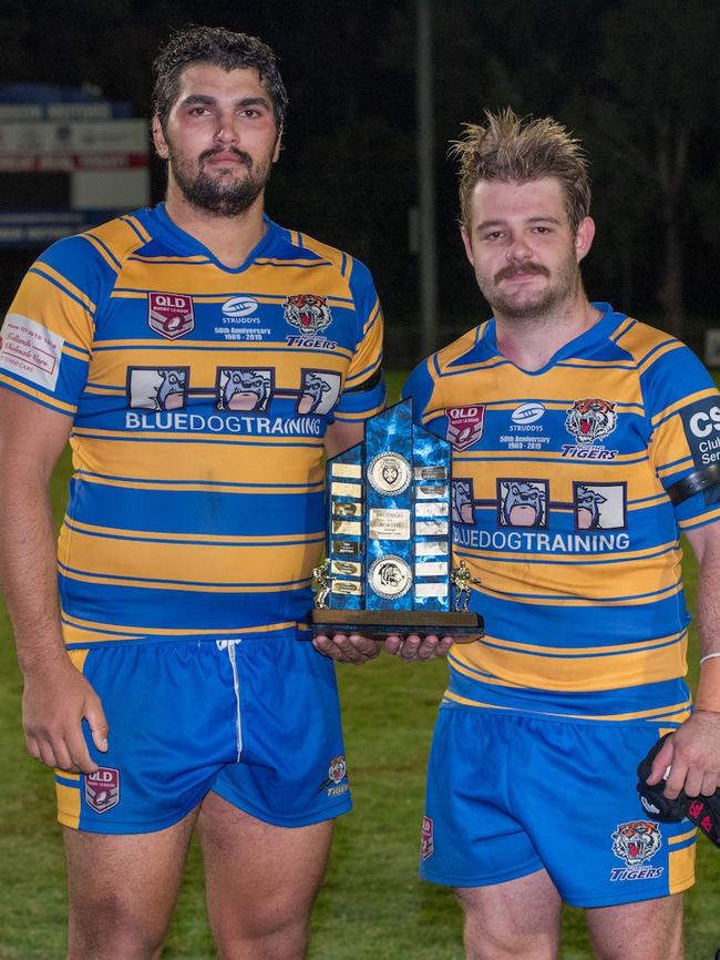 Tigers players Ethan Page and Lewis Smith with the Matt Dennis Trophy after Norths beat Brothers in the recent Rugby League Ipswich A-Grade match at Raceview. Picture: Bruce Clayton