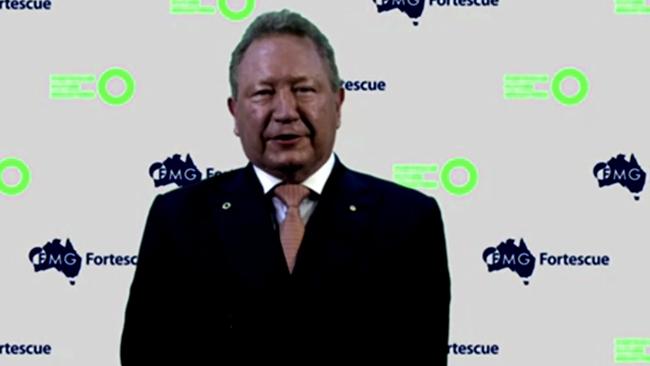 Chairman of Fortescue Metals Group Andrew Forrest appears on screen at the company's AGM in October.