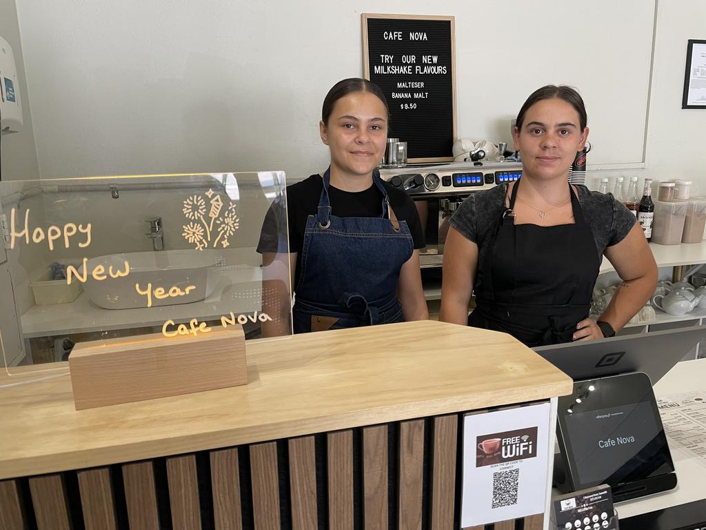 Cafe Nova co-owner Angel Houghton and staff member Iris Scott show off their newly created service area. Picture: Leighton Smith.