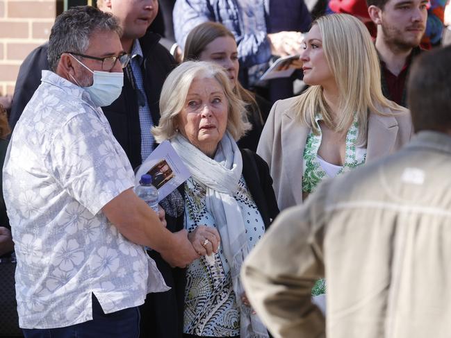 Margaret Bennett (centre) outside St Matthews Anglican Church after the service to celebrate the life and achievements of her husband Barry Bennett. Picture: Tim Hunter.