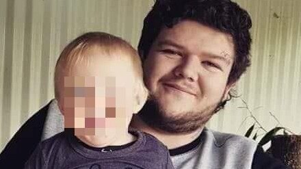 Alleged Burnie murder victim Bobby William Medcraft, 23, pictured with his young son. Picture: Facebook