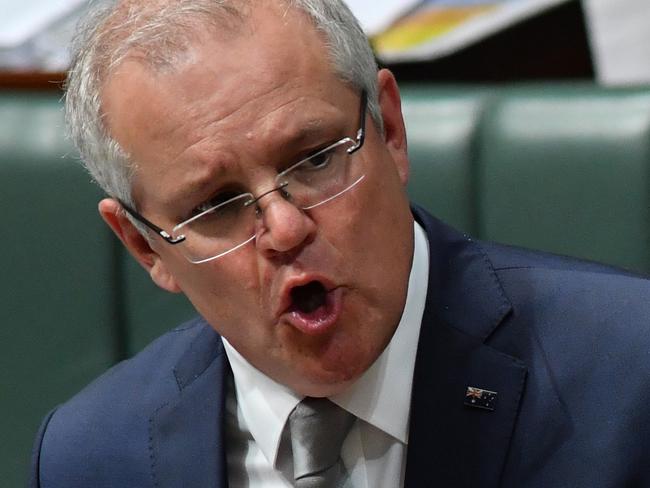 CANBERRA, AUSTRALIA - JUNE 10: Prime Minister Scott Morrison speaks at the despatch box during Question Time in the House of Representatives at Parliament House on June 10, 2020 in Canberra, Australia. The federal government is expected to make adjustments to the $70 billion Jobkeeper program which was introduced to help businesses retain staff during COVID-19 shutdowns. (Photo by Sam Mooy/Getty Images)