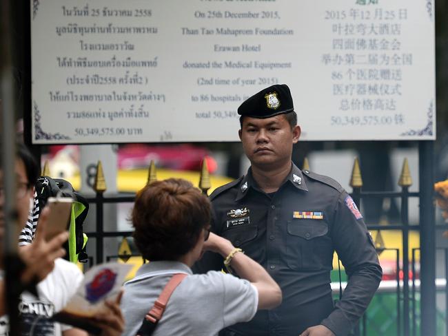 A Thai policeman stands guard near the Erawan Shrine. Picture: AFP.