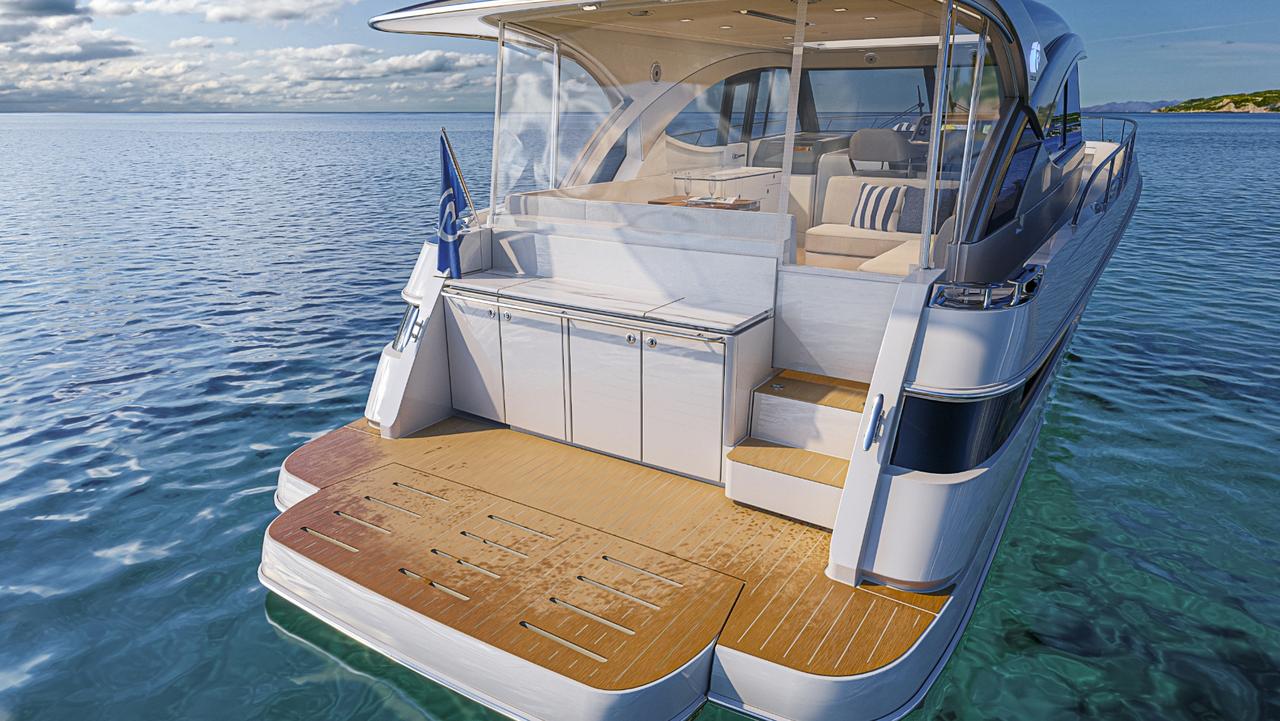 The boat’s boarding platform can lower into the water. Picture Riviera
