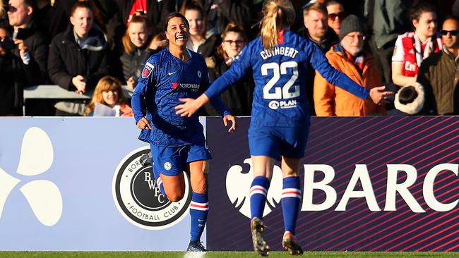 Sam Kerr, left, celebrates scoring for Chelsea against Arsenal in the Women’s Super League. Picture: Getty Images