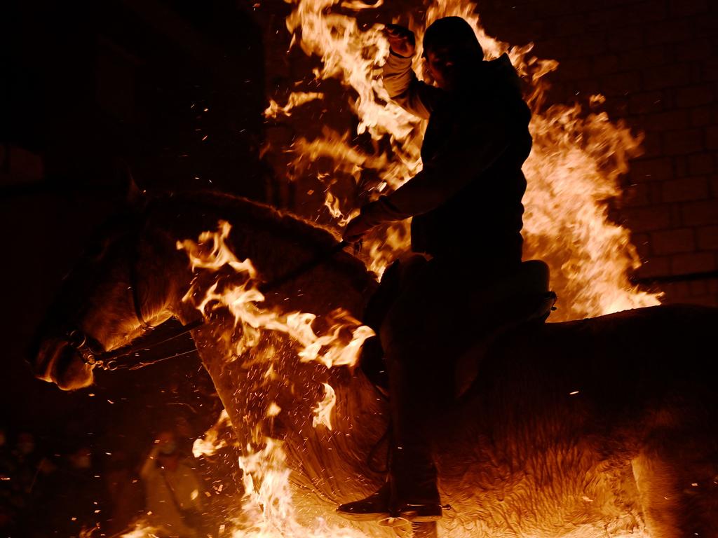 The riders typically have a drink before doing the daring stunt. Picture: Picture: Pierre-Philippe Marcou/AFP