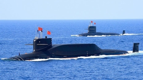 Chinese nuclear-powered missile and attack submarines parade for Chairman Xi Jinping. Picture: PLAN