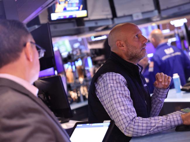 NEW YORK, NEW YORK - AUGUST 20: Traders work on the floor of the New York Stock Exchange during morning trading on August 20, 2024 in New York City. Stocks opened up with little change as the S&P 500 attempts to continue consecutive days of gains.   Michael M. Santiago/Getty Images/AFP (Photo by Michael M. Santiago / GETTY IMAGES NORTH AMERICA / Getty Images via AFP)