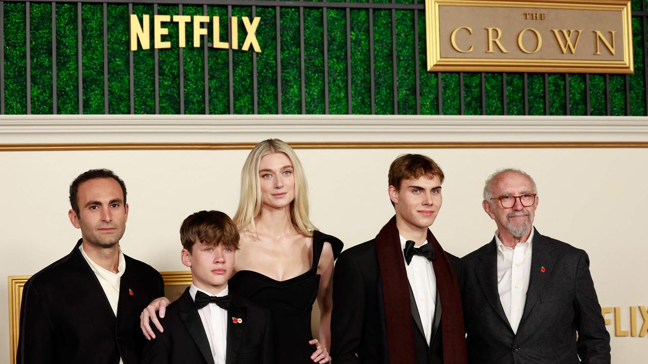 Gen Z Australians who cut loose from streaming behemoths like Netflix in a bid to save money will lose access to popular hits like The Crown. (From left to right) Season 6 Crown cast members Khalid Abdalla, Fflyn Edwards, Elizabeth Debicki, Rufus Kampa and Jonathan Pryce arrive for the Los Angeles premiere of the show on November 12, 2023. Picture: Michael Tran / AFP