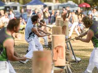 LOOKING SHARP: Woodchoppers compete at the Glenreagh Timber Festival last year. Picture: Adam Hourigan