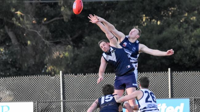 Gordon jostles with an opponent. Picture: Field of View Sports Photography