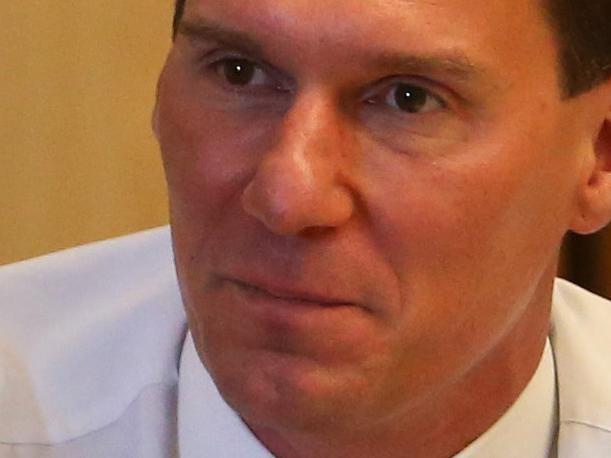 Senator Cory Bernardi, chair of the committee, discusses ejecting photographers from the room with the committee at a senate estimates hearing into Senate Finance and Public Administration Legislation Committee, at Parliament House in Canberra.