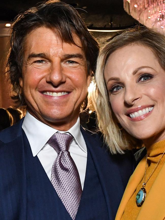 Tom Cruise had a glow when spotted with Marlee Matlin. Photo by VALERIE MACON / AFP.