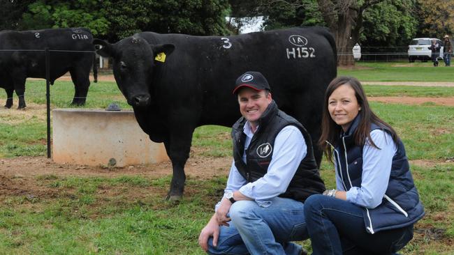 Corey and Prue Ireland, with a top-priced bull, which made $20,000, at one of their sales.