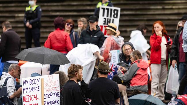 Protesters are seen occupy the steps at Parliament House as the Victorian parliament is debating the proposed pandemic bill. Picture: NCA NewsWire/Sarah Matray