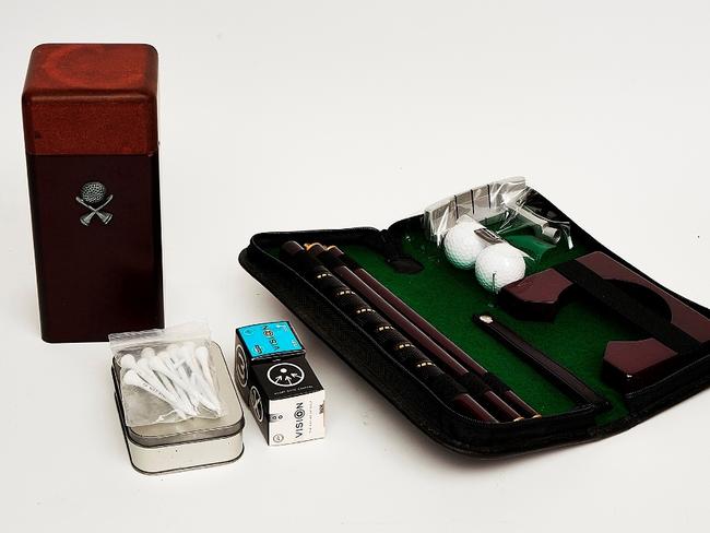 Auction of Bob Hawke & Blanche d'Alpuget Mementos Curiosities Art and Design: Assorted Golf Accessories comprising golf balls, box, novelty golf set, portable golf putter set and tees. Picture: Supplied