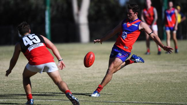 Mathew Golledge (right) of Mernda is seen in action during the Round 1 Northern Football League match at Cracknell Reserve in Planton Hill.