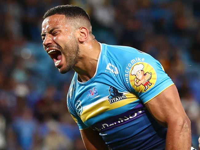 GOLD COAST, AUSTRALIA - APRIL 15: Kruise Leeming of the Titans scores a try during the round seven NRL match between Gold Coast Titans and Brisbane Broncos at Cbus Super Stadium on April 15, 2023 in Gold Coast, Australia. (Photo by Chris Hyde/Getty Images)