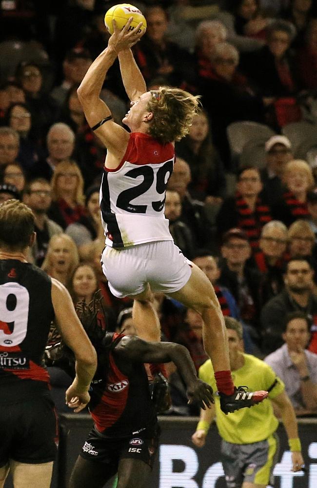 Jayden Hunt marks over Anthony McDonald-Tipungwuti. Picture: Wayne Ludbey