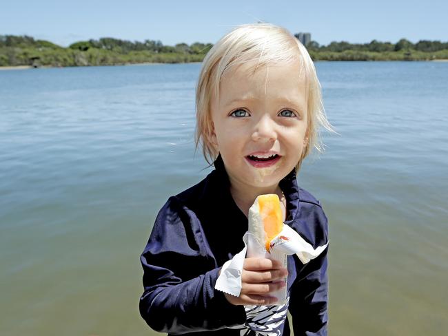 Blake Anderson, 2, enjoys a Mango Weis bar. Picture: Luke Marsden