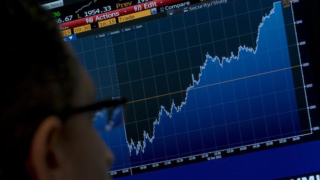 A specialist trader works at his post on the floor of the New York Stock Exchange October 5, 2015. REUTERS/Brendan McDermid