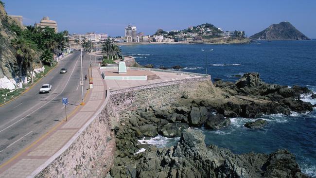 Deceptively beautiful ... The coast road in Mazatlan, Sinaloa, turns deadly at night. Picture: Getty