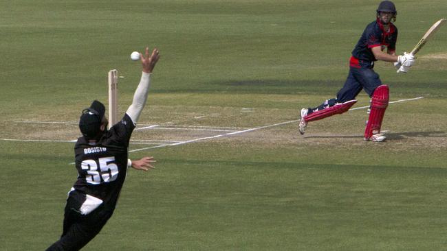 Adelaide University’s Will Bosisto attempts a catch during the Twenty20 grand final against East Torrens. Picture: AAP/Emma Brasier