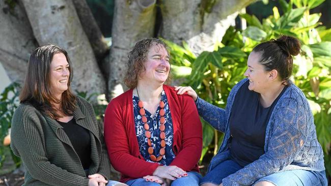 Roxy Tickle enjoying the beautiful Northern Rivers weather with softball teammates Shay Kelly and Lauren Forrester in Lismore. Picture: Marc Stapelberg