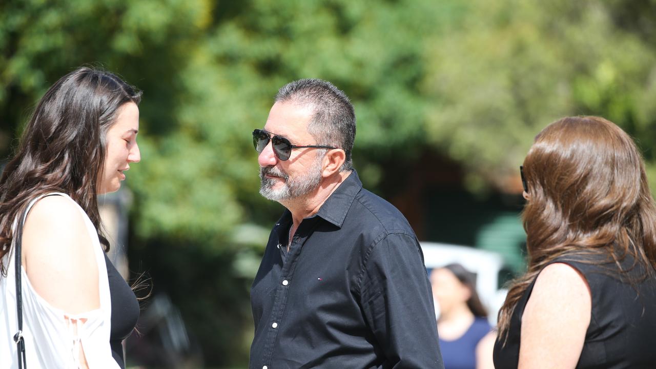 Godmother Martina Bekic (wearing white) of young Nicholas arrives and is greeted by Friends and family at the Funeral for Seaworld helicopter crash victim Vanessa Tadros at St John the Beloved Church, Mt Druitt. Picture NCA Newswire / Gaye Gerard