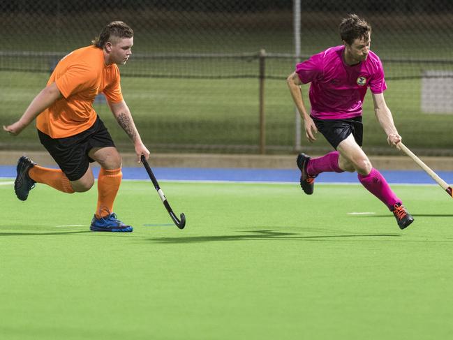 HSR Hot Shots player Braydon Denman (left) and Craig Smith of Agetal Farmers in Club Glenvale Challenge round four men's hockey at Clyde Park, Friday, March 5, 2021. Picture: Kevin Farmer